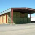 Steel Buildings vs Pole Barns: Which Lasts Longer on a Working Farm?